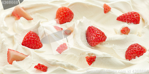 Image of whipped cream with strawberries