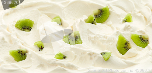 Image of whipped cream with kiwi