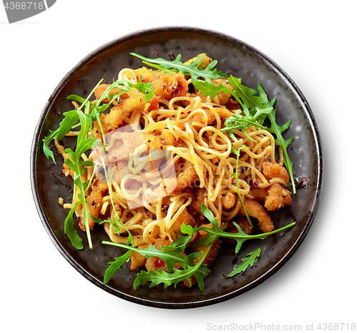 Image of Plate of asian noodles with fried meat