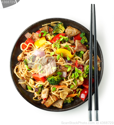 Image of Plate of noodles with meat and vegetables