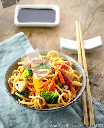 Image of Asian egg noodles with vegetables and meat