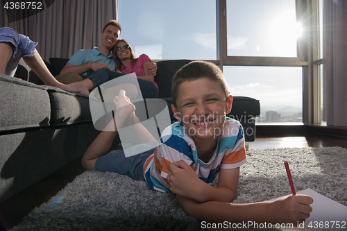 Image of young couple spending time with kids