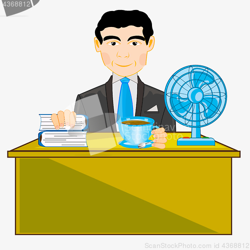 Image of Man in office at the table