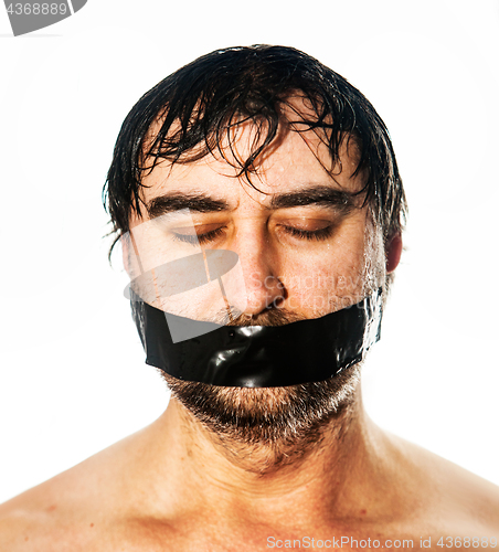 Image of man with black tape