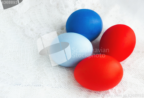 Image of Colorful Painted Easter Eggs On A Lace