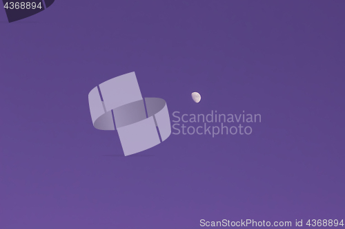 Image of The Moon On The Purple Cloudless Sky