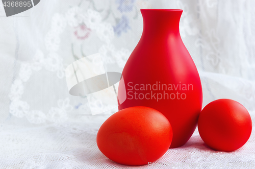 Image of Two Easter Eggs And A Jug On A Lace