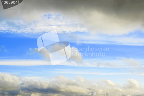 Image of Cloudy frame in blue sky