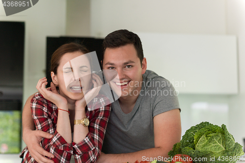 Image of Young couple in the kitchen