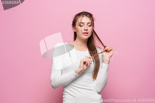 Image of The young woman\'s portrait with thoughtful emotions