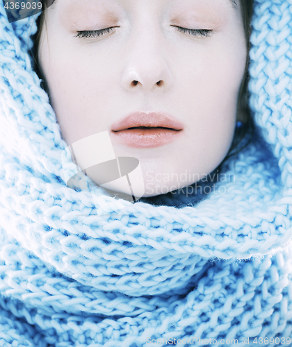 Image of beauty young blond woman in scarf with weathered lips close up isolated