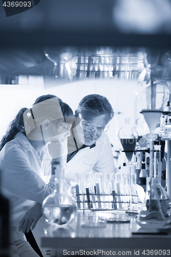 Image of Health care professionals researching in scientific laboratory.