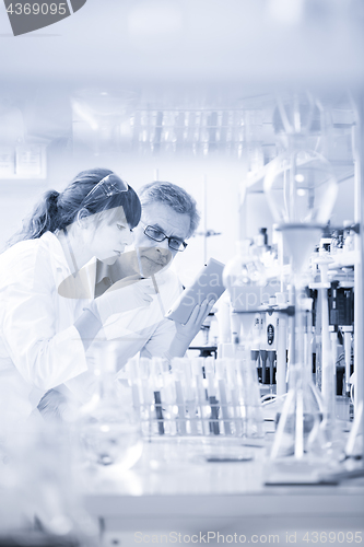 Image of Health care professionals researching in scientific laboratory.