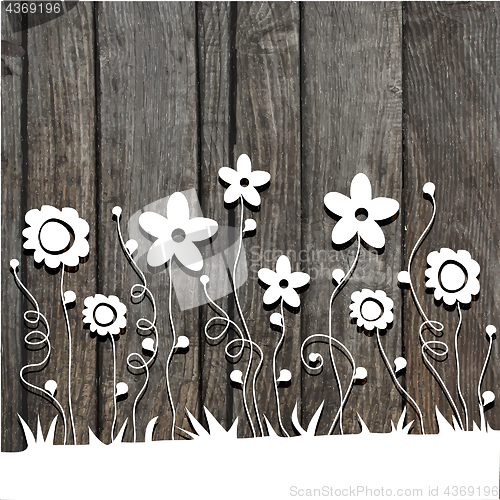 Image of paper  cut flowers on wooden background