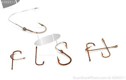 Image of Word F I S H composed of old rusty fish hook