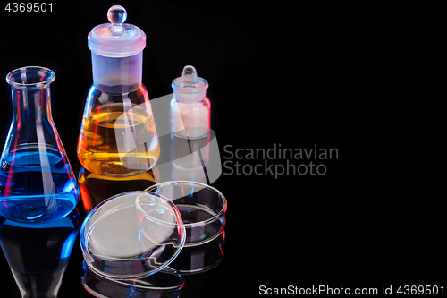 Image of The Chemistry Lab background. Various glass chemistry lab equipment