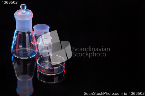 Image of The Chemistry Lab background. Various glass chemistry lab equipment