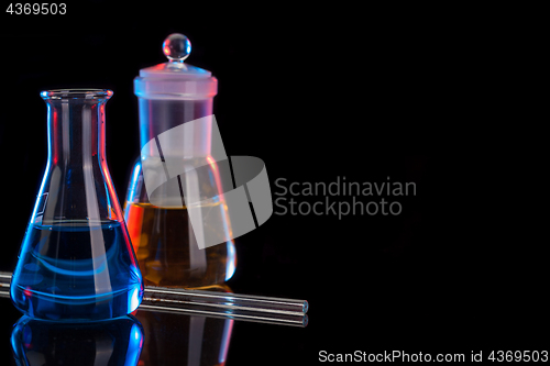 Image of The Chemistry Lab background. Various glass chemistry lab equipment