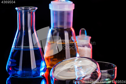 Image of The Chemistry Lab background. Various glass chemistry lab equipment