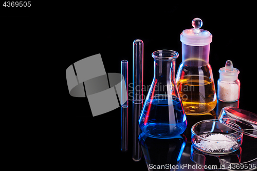 Image of The Chemistry Lab background. Various glass chemistry lab equipment