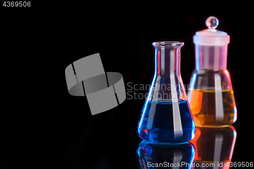 Image of The Chemistry Lab background. Various glass chemistry lab equipment