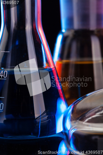 Image of The Chemistry Lab background. Various glass chemistry lab equipment