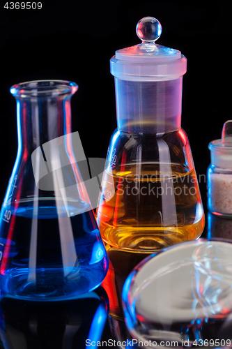 Image of The Chemistry Lab background. Various glass chemistry lab equipment