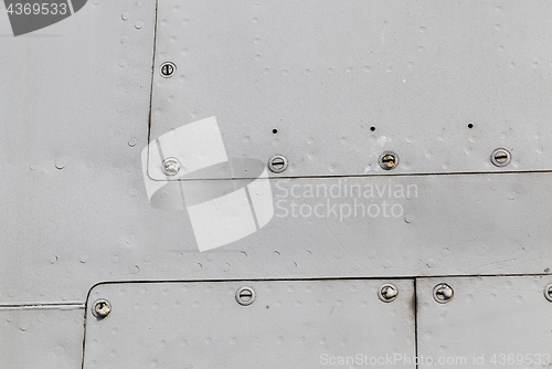 Image of metal surface with rivets