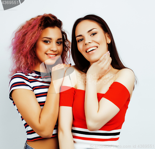 Image of best friends teenage girls together having fun, posing emotional on white background, besties happy smiling, lifestyle people concept, blond and brunette multi nations 