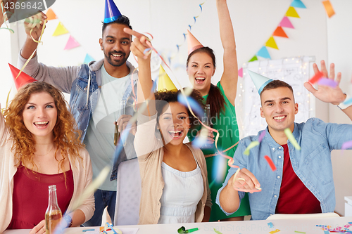 Image of happy team having fun at office party