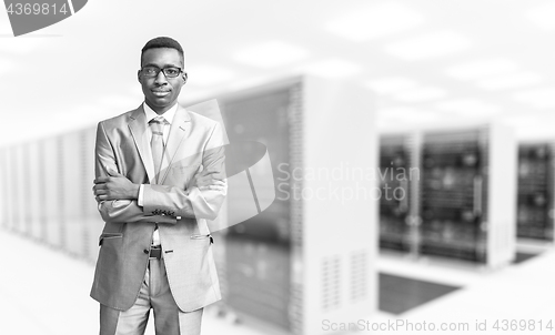 Image of Young black man in server room