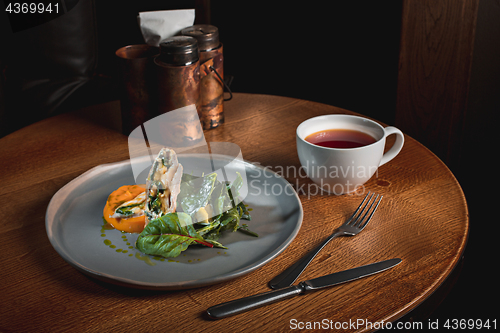 Image of simmered pumpkin with Japanese broth and minced meat sauce