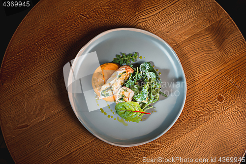 Image of simmered pumpkin with Japanese broth and minced meat sauce