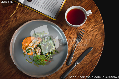 Image of simmered pumpkin with Japanese broth and minced meat sauce