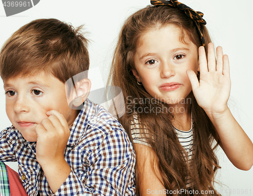 Image of little cute boy and girl hugging playing on white background, happy family smiling twins