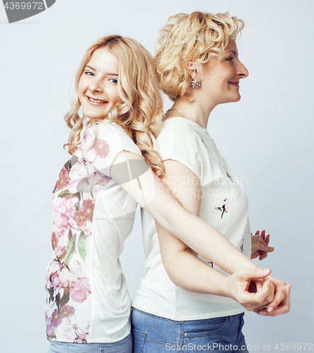 Image of mother with daughter together posing happy smiling isolated on white background with copyspace, lifestyle people concept 