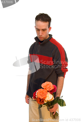 Image of Male Holding a Vase of Flowers