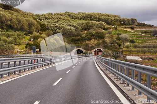 Image of Highway with approaching tunnel