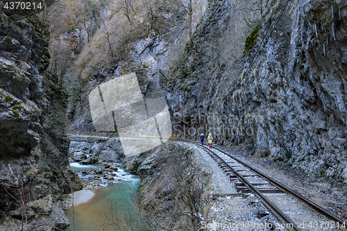 Image of Tourists  in a mountain gorge