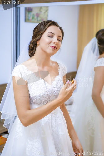 Image of Bride getting ready for the wedding in the morning.