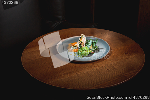 Image of simmered pumpkin with Japanese broth and minced meat sauce