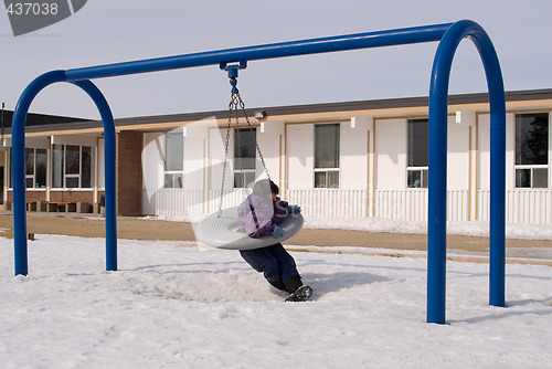 Image of Child On Tire Swing