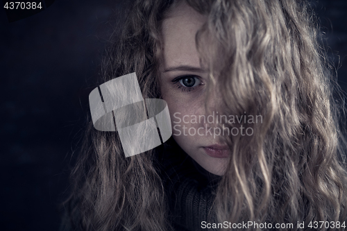 Image of Portrait of a young sad girl.