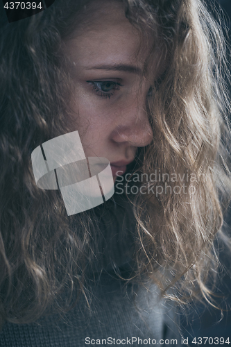 Image of Portrait of a young sad girl.