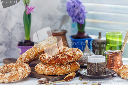 Image of Turkish bagels with sesame seeds and coffee for breakfast.