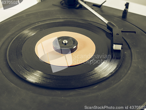 Image of Vintage looking Vinyl record on turntable