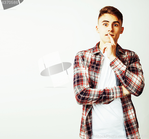 Image of young handsome teenage hipster guy posing emotional, happy smiling against white background isolated, lifestyle people concept 