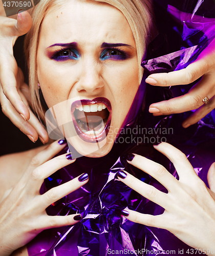 Image of beauty woman with creative make up, many fingers on face