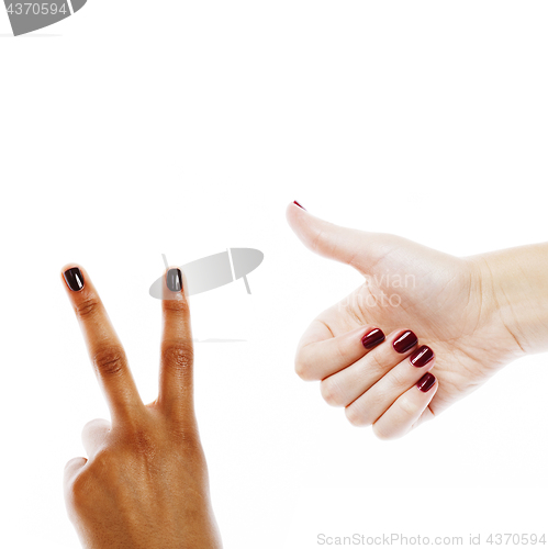 Image of two different nathion manicured hands on white isolated