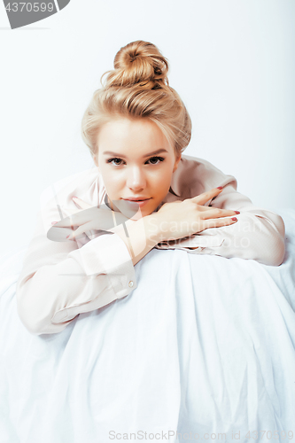 Image of young pretty woman happy smiling, laying in bed, lifestyle people concept
